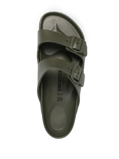 Green buckled sandals